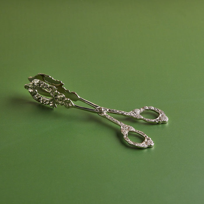 Silver Whisper – Handcrafted Brass Dessert Tong